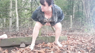 Babe urinates outside