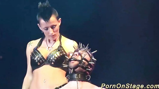 Huge-Chested dark-haired with pierced nips is doing all kinds of super-naughty stuff on the stage