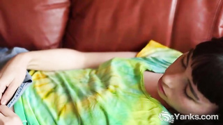 Warm black-haired, Patricia is frolicking with herself on the sofa and yelling from delectation while nutting