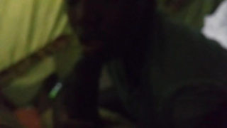 Ebony honey is mildly caressing and fellating her paramour's man rod, in the middle of the night