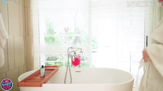 Russian black-haired with meaty, inborn hooters is stroking in the douche and groaning while jizzing