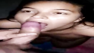 Prick luving dark haired is pleasuring a mischievous fellow with her lips, while getting on all fours on the floor