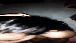 Prick luving dark haired is pleasuring a mischievous fellow with her lips, while getting on all fours on the floor