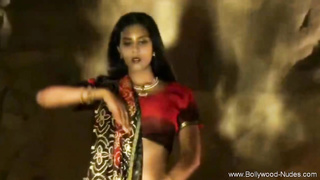 Indian stunner is leisurely taking off her clothes while dancing in front of the camera