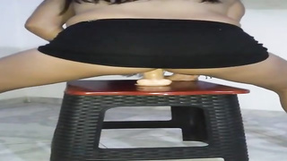 Smallish Colombian honey is caressing her nub while railing a fuck stick, to spice it up