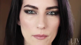 Nymph with dark hair and exotic make-up showcases off her tongue abilities for those with a hatch fetish