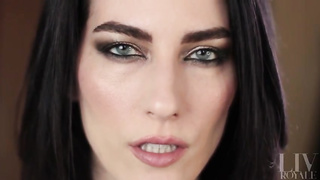 Nymph with dark hair and exotic make-up showcases off her tongue abilities for those with a hatch fetish