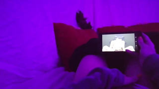 Chick POINT OF VIEW of a nymph draining in a dim-lit apartment while observing manga porn on her smartphone