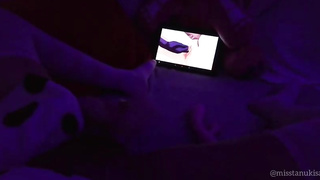 Wild Asian fuckslut dims the light and plays with her cunny while witnessing anime porn on her smartphone
