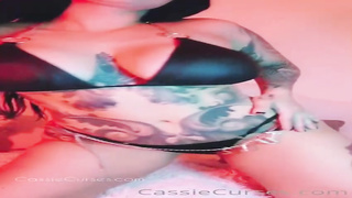 CaCu is a buxomy, tatted dark haired who enjoys to have fun with herself in front of the camera