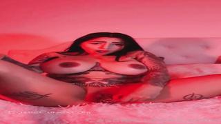 CaCu is a buxomy, tatted dark haired who enjoys to have fun with herself in front of the camera