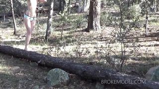 Kinky chick stretching at kinky waterfall