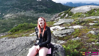 Russian red-haired is draining in the nature, in the middle of the day and groaning while nutting