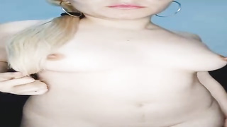 All-innate nymph is dressed in nothing but a black mask while tugging on the sofa