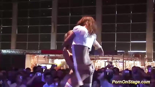 Crimson haied stunner is making out with a smoking super-fucking-hot ash-blonde on the stage and loving it