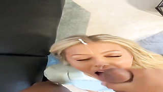 Racy blondie is inhaling a rock rock-hard, black knob before railing it like a professional