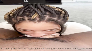 Naive Ebony stunner is anxiously blowing a ample, black knob while getting down on all fours on the floor