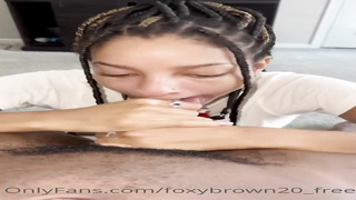 Naive Ebony stunner is anxiously blowing a ample, black knob while getting down on all fours on the floor