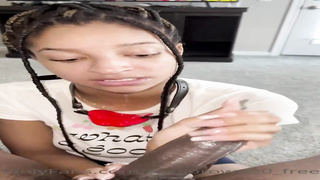 Naive Ebony stunner is anxiously blowing a ample, black knob while getting down on all fours on the floor