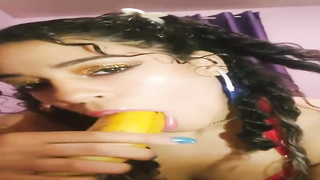 Fledgling brown-haired with curly hair is displaying her man rod deep-throating routine with a yam-sized banana