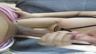 Frolic black-haired is fellating her colleague's trunk after fondling it with her puny, inborn titties