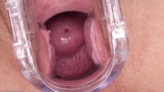 Taissia Shanti is using a gynecologist's implement and thumbs while milking in front of the camera