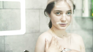 Smallish gal, Anna is having a douche in front of the camera, just for joy