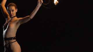 Cute teen Elilith Noir playing with fire