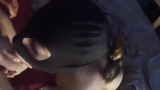 Hooded honey is inhaling a rock rigid manhood as deep as she can, late at night