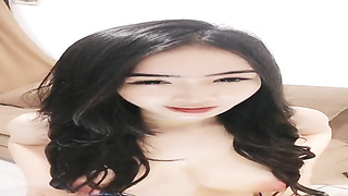 Extraordinaire dark-haired is posing and taunting nude, in front of the camera, just for joy