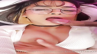 Honey with glasses is doing wild stuff in front of the camera, late at night