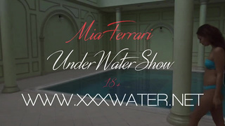 Crimson haired stunner with smallish funbags took off her bathing suit in the swimming pool, just for joy