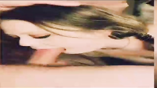 Sara Marie is impatiently blowing her paramour's rock-hard penis while getting down on all fours in front of him