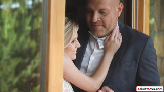 Petite bride is dped by hubby and waiter