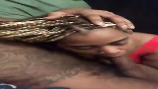 Ebony honey with ash-blonde hair is impatiently blowing a good-sized, black man rod as deep as she can