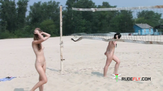 Dashing young nudist chicks have fun at the beach