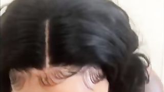 Tattoed, Ebony female is providing a head to a crazy, black dude and gobbling new spunk