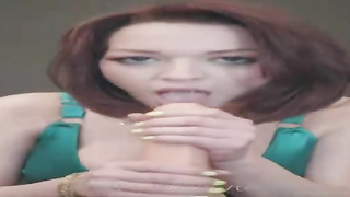Crimson haired manmeat teaser is blowing her favourite, huge fake penis in front of the camera