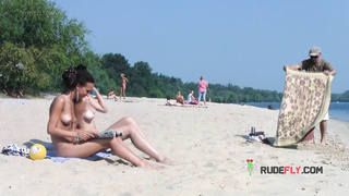 Skinny and young nudist chicks fool around