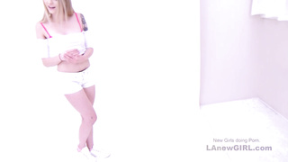 Gorgeous girl with pink socks gives footjob in studio