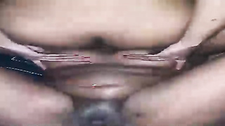 Plump, Ebony dame is holding her gams opened up broad open while getting smashed highly rigid