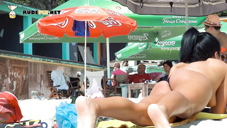 Pretty nudist teen enjoys her summer topless outdoors