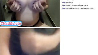 Playing with her huge natural tits