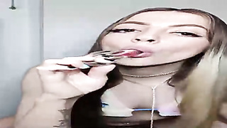 Sugary-Sweet woman is using a glass fake penis while stroking, because it always makes her jizm