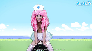 Pinkish haired nurse, Delilah Day is railing a Sybian Saddle and squealing from sheer pleasure while spunking
