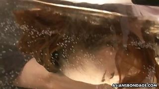 Ball-Gagged Chinese doll got strapped up and tantalized while being coerced to jism, as well