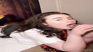 Grubby minded brown-haired is fellating a ginormous, glass fuck stick before milking in front of the web camera