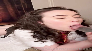 Grubby minded brown-haired is fellating a ginormous, glass fuck stick before milking in front of the web camera