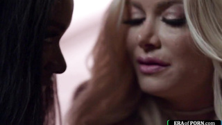 Ebony girl fucks a milf pussy with a toy