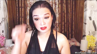 Brunette amateur in black on webcam